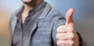 person giving thumbs up