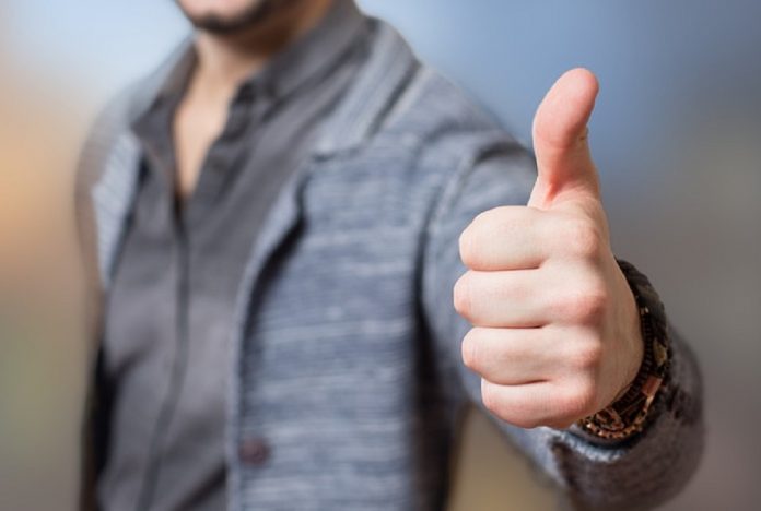 person giving thumbs up