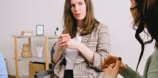 coach with client in office