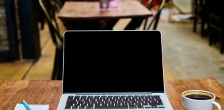 open laptop of hybrid worker