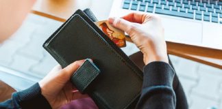 woman holding wallet