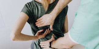 patient being examined for back problems