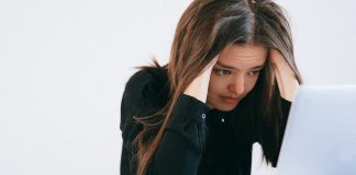 stressed employee at laptop