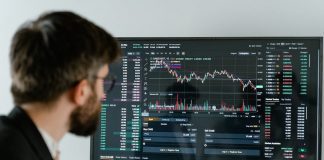 Entrepreneur looking at downward graph