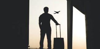 man waiting at airport