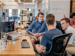 team discussing hiring strategy