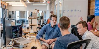 team discussing hiring strategy