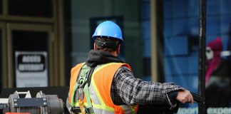 Construction worker in full Health & Safety regulation equipment