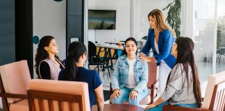 employees at wellbeing meeting