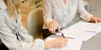 employee signing employment contract
