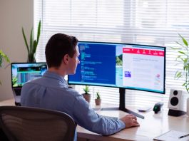 HR professional working at computer