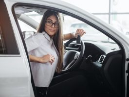 employee in company car